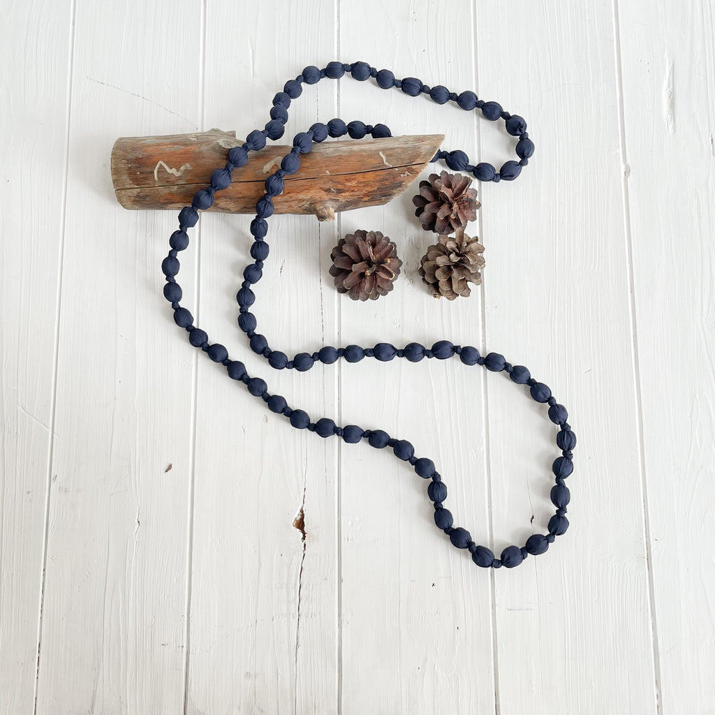 COLLAR BOLAS TELA