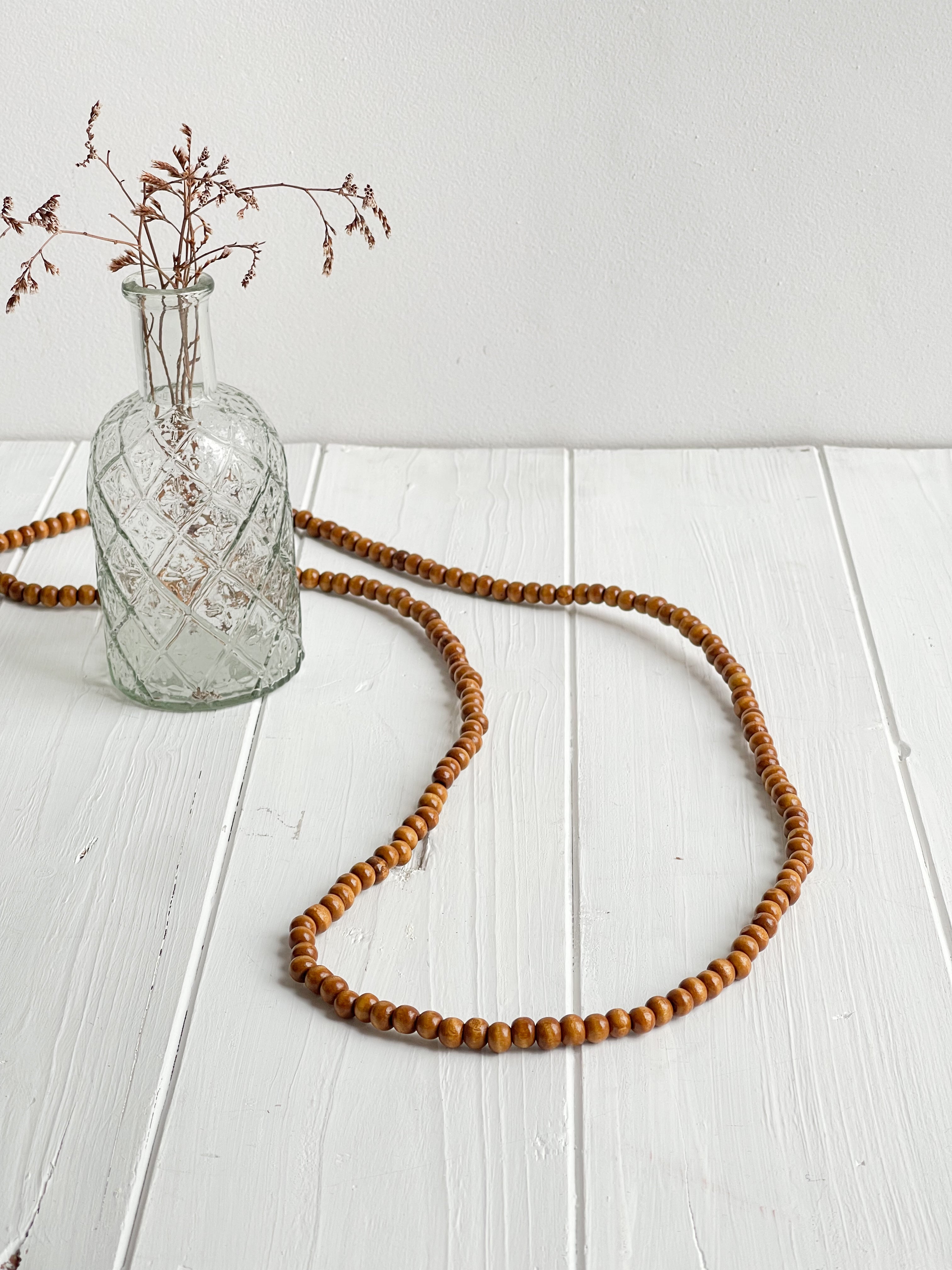 COLLAR BOLAS MADERA CAMEL