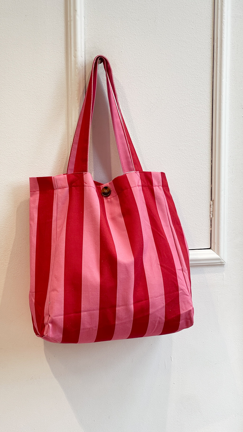 BOLSO RAYAS FUCSIA