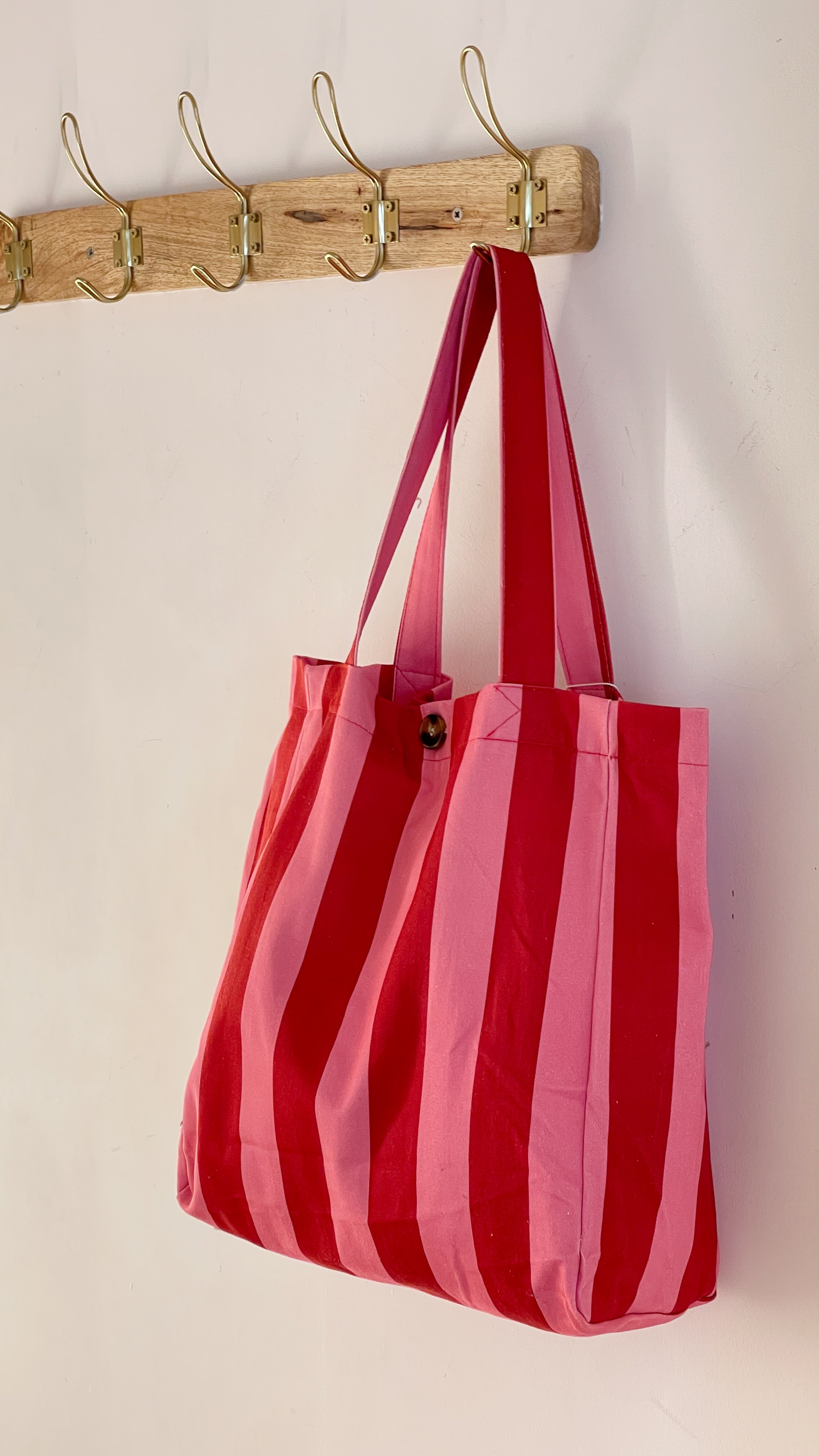BOLSO RAYAS FUCSIA